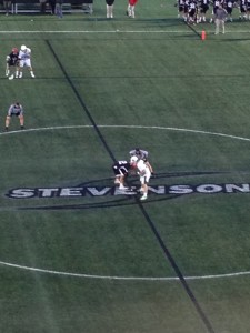 Jr Brent Hiken faces off for Stevenson. The Mustangs won 15 of 27 at the X position.